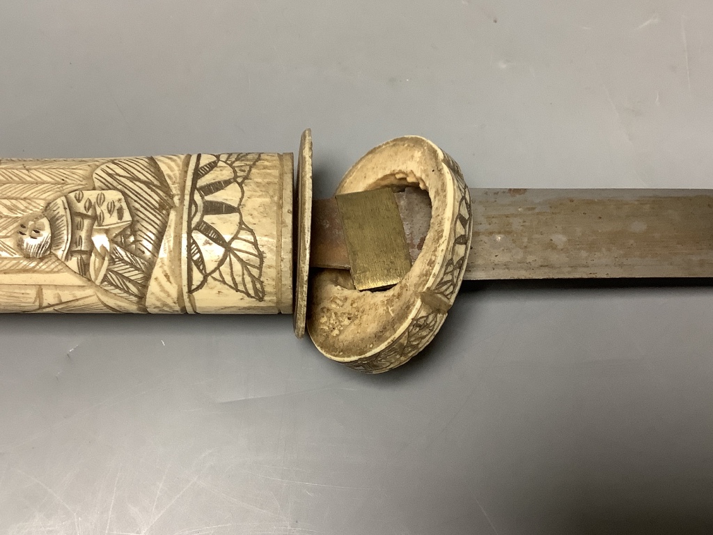 A Japanese bone tanto and a Chinese brush pot